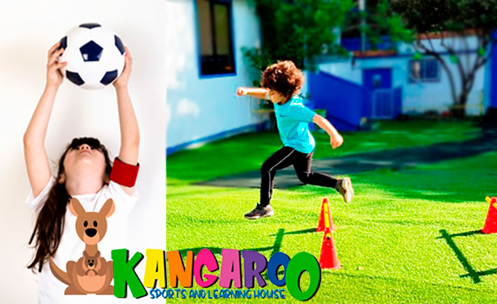 Niños jugando fútbol como parte del programa deportivo diario